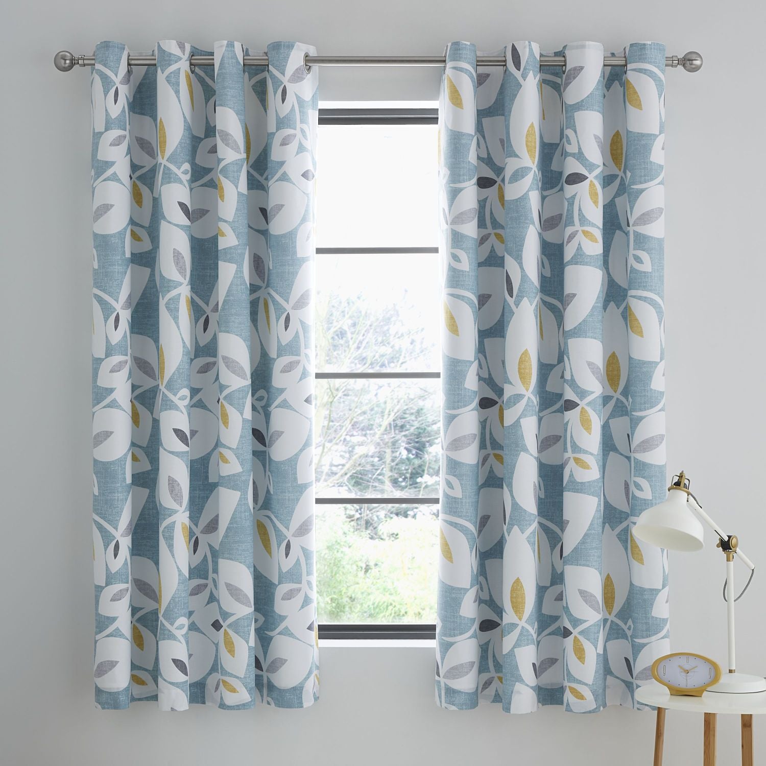 Catherine Lansfield Inga Leaf Teal Lined Eyelet Curtains