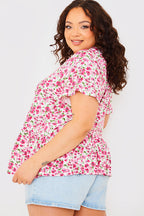Sustainable Floral Peplum Top